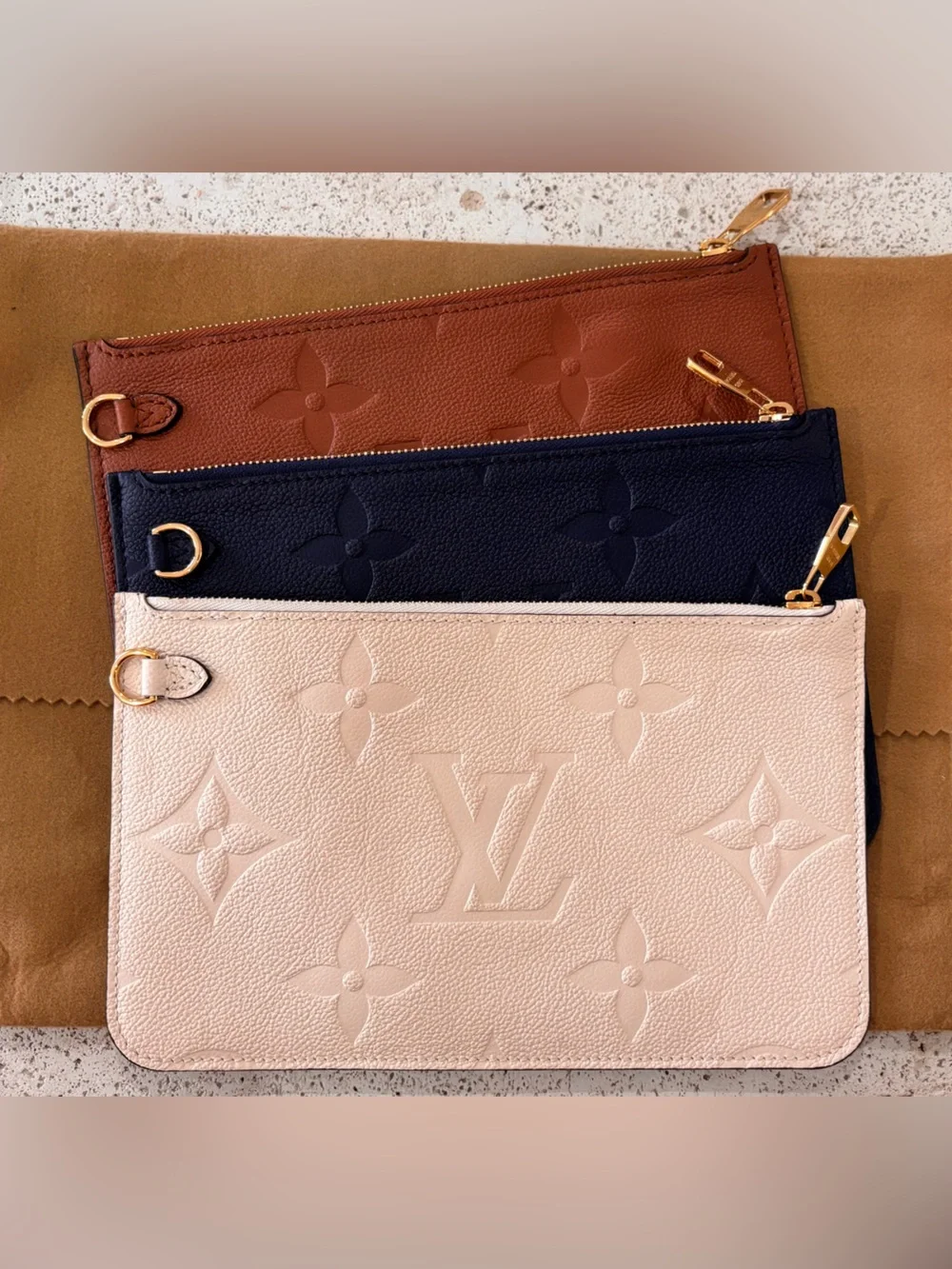 Authentic Louis Vuitton Neverfull Empreinte GM cognac pouch wristlet